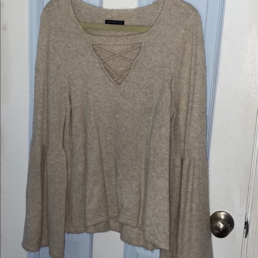 Oatmeal- colored sweater